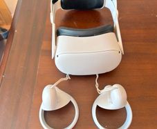 Meta Quest 2 Virtual reality headset. With 2 controllers. In near perfect condition ( barely used ). Has been restored to factory settings. Charges via usb C ( NOT included ). Original head strap was faulty so it had to be replaced.