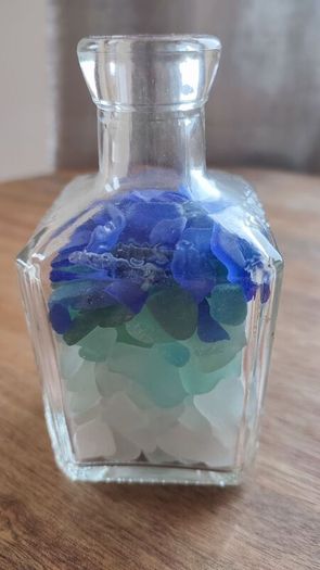 square bottle with sea glasses