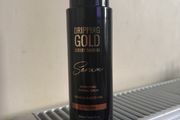 Dripping gold tan serum