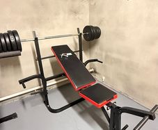 Gym bench, bar and weights.