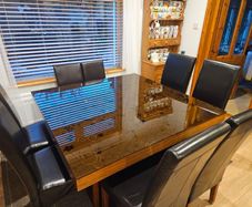 Large designer contemporary dining table and 6 large leather chairs with 2 smaller leather chairs