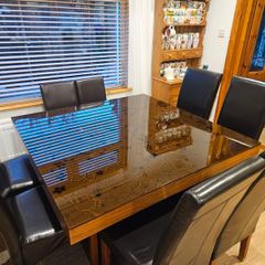 Large designer contemporary dining table and 6 large leather chairs with 2 smaller leather chairs