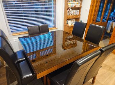 Large designer contemporary dining table and 6 large leather chairs with 2 smaller leather chairs