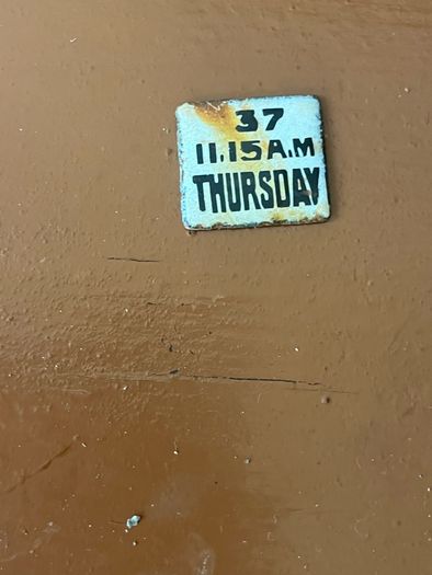 Original Enamel signs license to sell stamps. Collection times and days