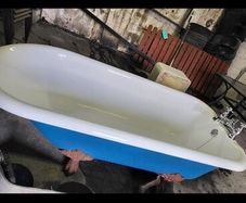 Cast iron bath, sink, toilet and pull chain cister