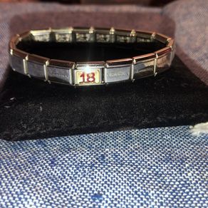 Nominations bracelet with 18th birthday charm