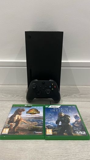 xbox series X with original controller and Jurassic World evolution two and halo infinity