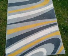 large rug 67 inches X 47 inches