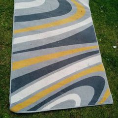 large rug 67 inches X 47 inches