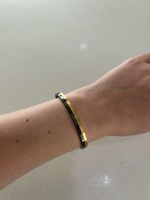 Calvin Klein black and gold bangle