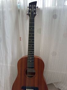 Acoustic Guitar with accessories Almost New