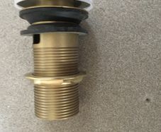 Brushed brass pop up plug & waste