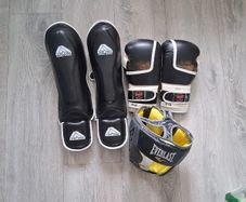 Boxing gloves, shin pads and headgear