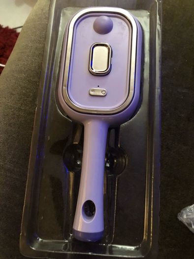 Electric spray comb
