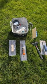 Tiling and plastering tool set with bucket