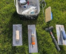 Tiling and plastering tool set with bucket