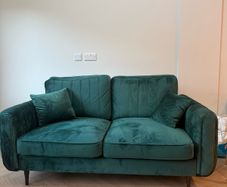 Green velvet sofa
