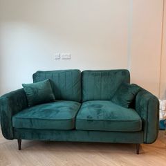 Green velvet sofa