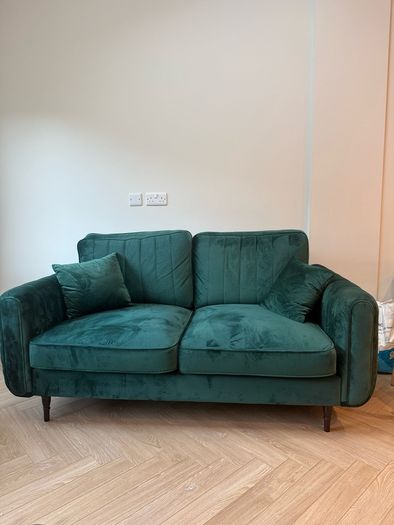 Green velvet sofa