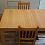 Solid Table and 4 Chairs Image 2