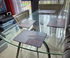 Modern Rectangular Glass Dining Table with Chrome Legs and 4 white chairs