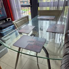 Modern Rectangular Glass Dining Table with Chrome Legs and 4 white chairs