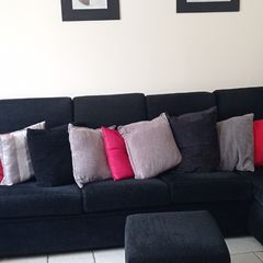 L shape sofa and armchair c/w 3 footstools