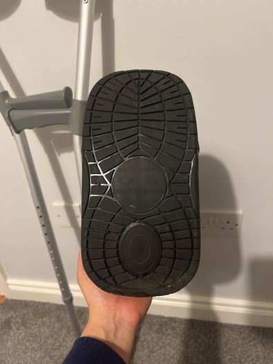 Pair of crutches and orthopedic boot