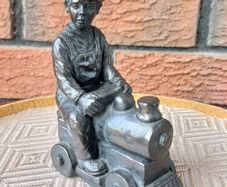 Jeanne Ryhnart Cold Cast Bronze "Boy On Train" Sculpture