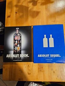 Absolute Books  X 2. The Absolute Vodka Advertising Story. 2 First Edition Large Volume 1x Hardback And 1x Paperback.  Both In Very Good Condition.  See Photos For Same.