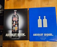 Absolute Books  X 2. The Absolute Vodka Advertising Story. 2 First Edition Large Volume 1x Hardback And 1x Paperback.  Both In Very Good Condition.  See Photos For Same.