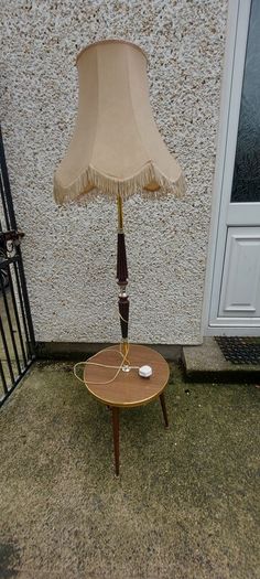 1960s /70s french art deco table floor lamp ,working,,used nice condition,3 legs veneer, see pictures for condition ,buyer collects, sold as seen,freestanding.