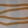 Vintage yellow beads made of natural freshwater pearls. Image 2