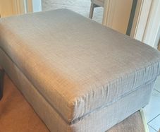Grey footstool