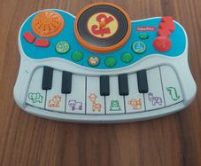 Fisher-Price toy keyboard and DJ deck