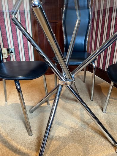 Tempered glass table and 4 matching chairs