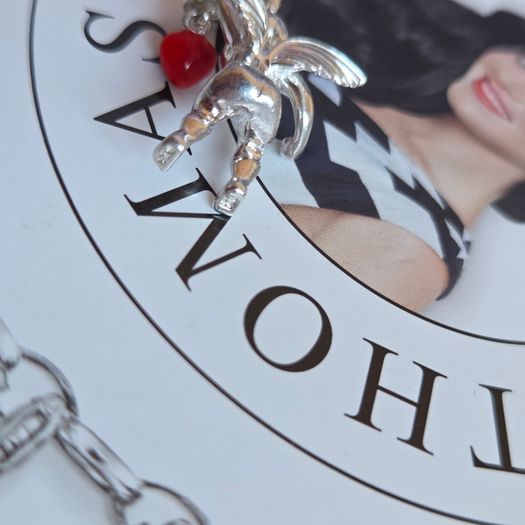 Thomas Sabo sterling silver Angel charm holding a red heart