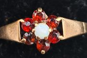 Vintage 9ct yellow garnet and opal cluster ring