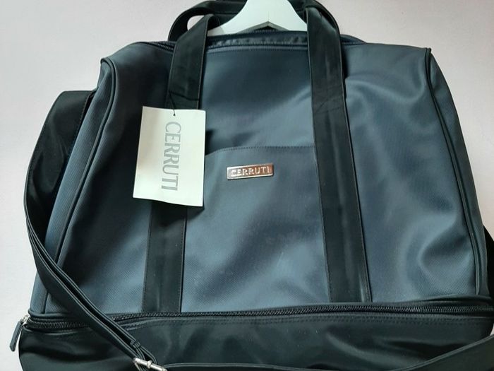 New strong travel /gym bag with tag and crossover strap