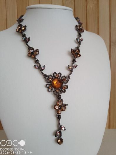 Victorian revival aesthetic  dark antiqued metal with warm amber tones