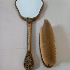 Vintage mirror and brush
