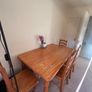 Wooden dining table with chairs Image 2