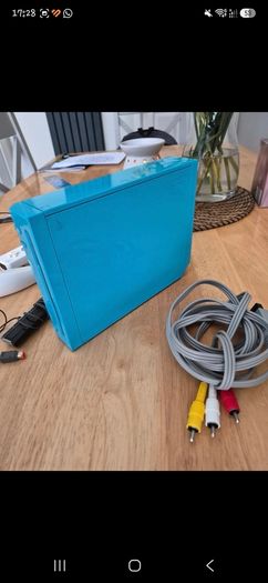 Nintendo Wi console in blue.