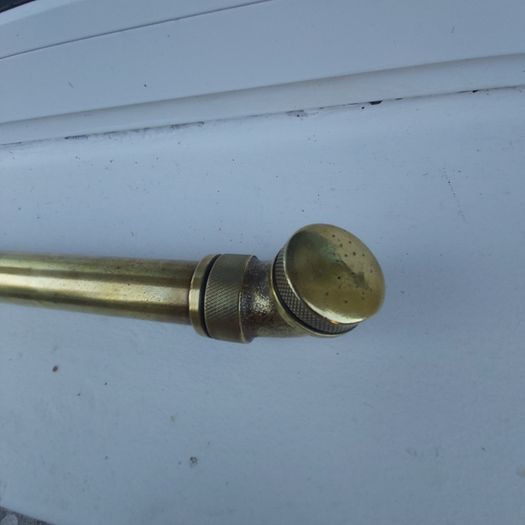 Old brass rose bush sprayer