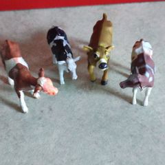 Collection of 4 COWS animal Farm toys .