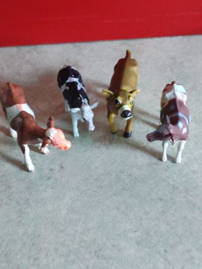 Collection of 4 COWS animal Farm toys .