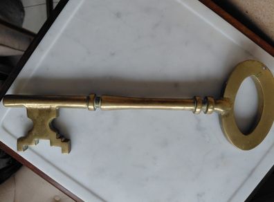 Antique solid brass ornamental key 35cm in length