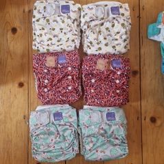 10 bambino mio cloth nappies from birth to 2 years. Velcro fastening, 12 x cloth inserts . All used but plenty of life left. Nappy bag in perfect condition.