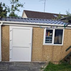 Deluxe 14ft x 12ft Modular Concrete Building Shed with brindle pebble dash finish.