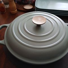 cast, enamelled shallow casserole dish.